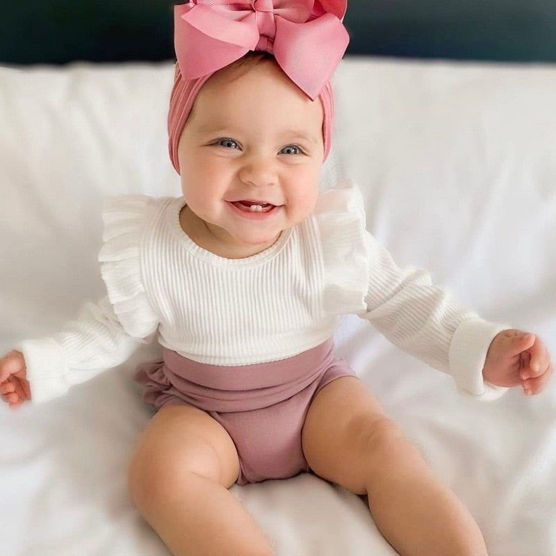 Ribbed Ruffle Sleeve Onesie & Matching Bow in White