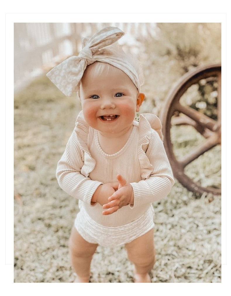 Ribbed Ruffle Sleeve Onesie & Matching Bow in Beige