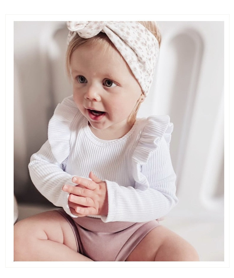 Ribbed Ruffle Sleeve Onesie & Matching Bow in White