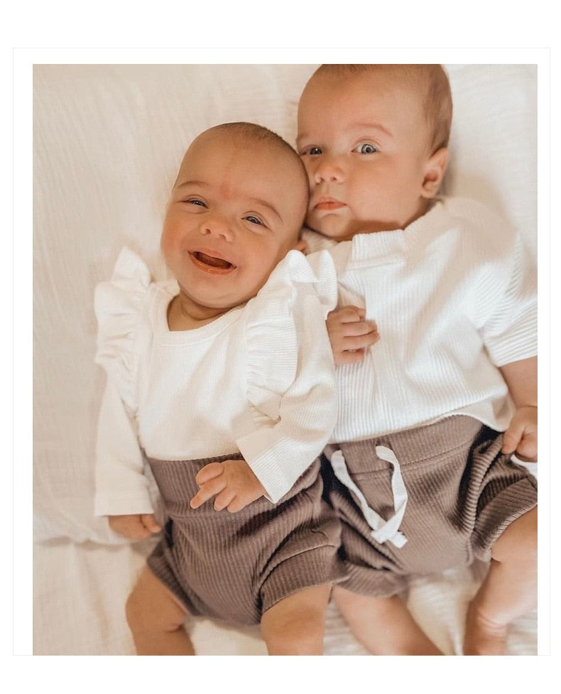 Ribbed Ruffle Sleeve Onesie & Matching Bow in White